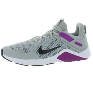 Nike Women’s Legend Essential sneaker in light smoke grey/vivid purple. Size 10